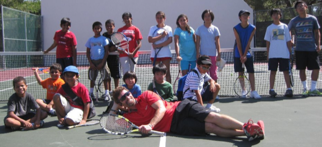 Gleason Tennis junior camp group on court