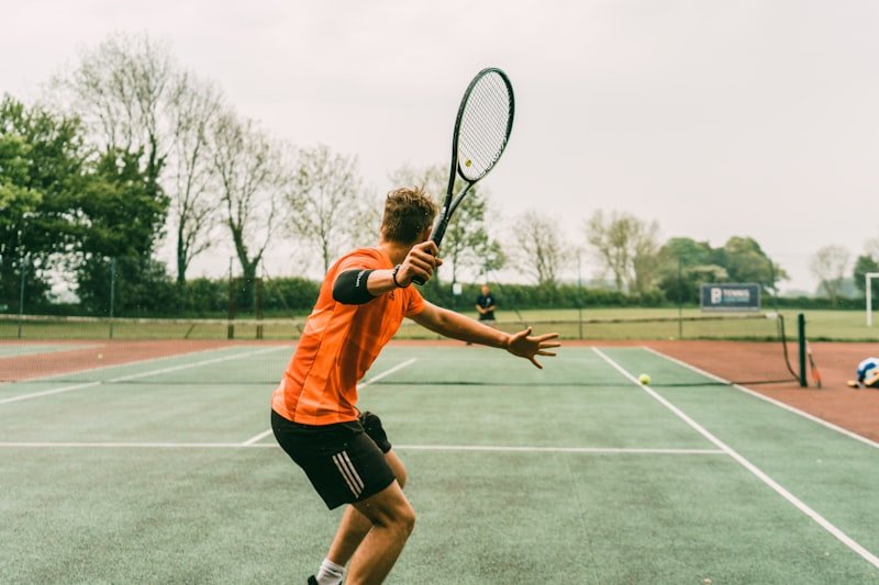 Tennis player hitting an action forehand